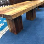 A HARDWOOD ELM DINING TABLE