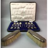 A CASED SET OF TWELVE COFFEE SPOONS IN FITTED CASE