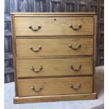 A MODERN CHEST OF PINE DRAWERS