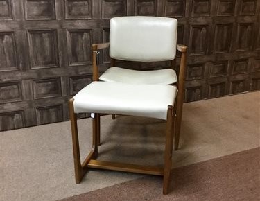 A DANISH STYLE ARMCHAIR AND A STOOL