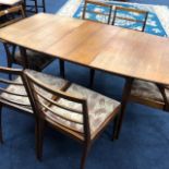 A RETRO TEAK DINING TABLE AND CHAIRS
