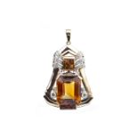 AN IMPRESSIVE CITRINE AND DIAMOND PENDANT