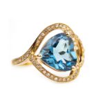 A TREATED BLUE TOPAZ RING