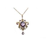 AN IMPRESSIVE EDWARDIAN AMETHYST AND SEED PEARL PENDANT