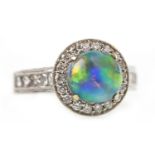 AN OPAL AND DIAMOND RING