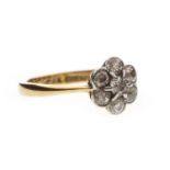 A DIAMOND FLORAL CLUSTER RING