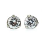 A PAIR OF DIAMOND STUD EARRINGS