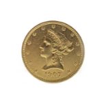 A GOLD USA TEN DOLLAR COIN, 1907