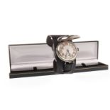 A SILVER TRENCH WATCH