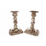 A PAIR OF VICTORIAN SILVER TABLE CANDLESTICKS