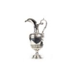 A VICTORIAN SILVER CLARET JUG