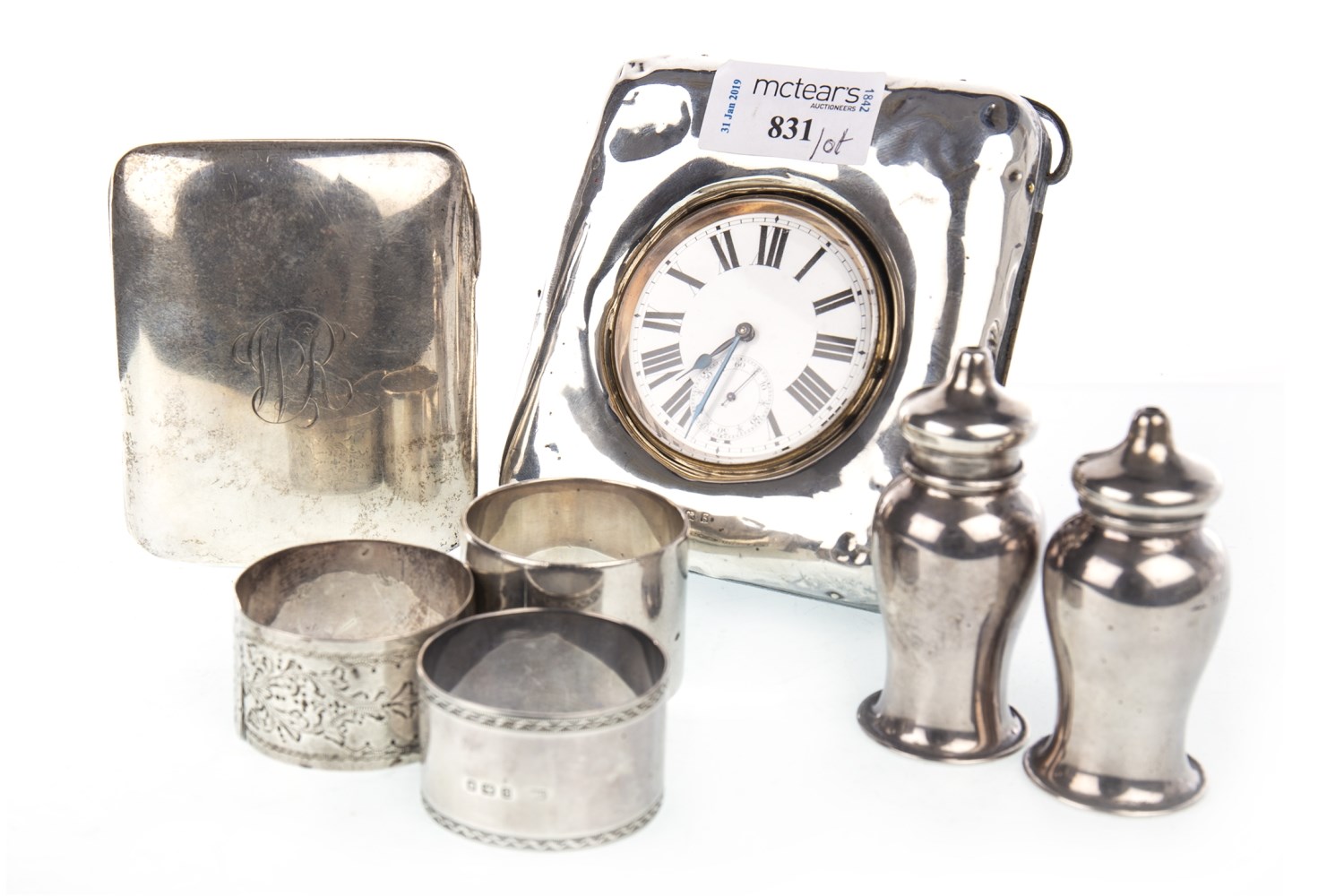 A SILVER TRAVELLING TIMEPIECE AND OTHER SILVER ITEMS