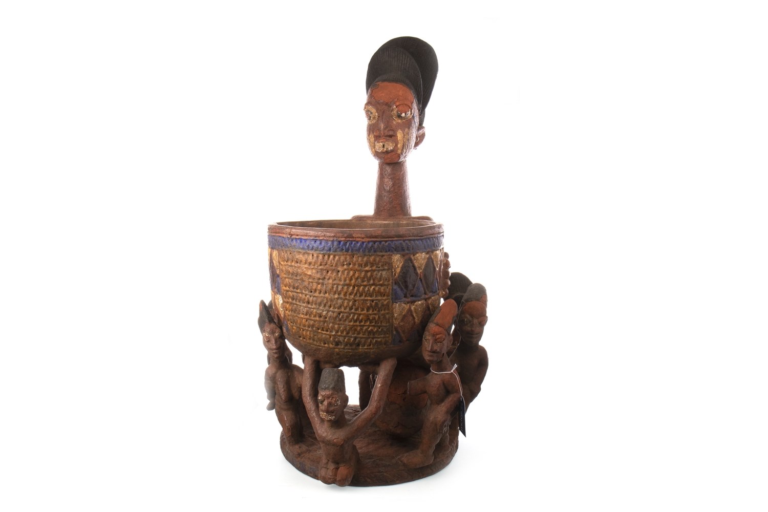 AN AFRICAN CARVED WOOD FIGURE WITH BOWL