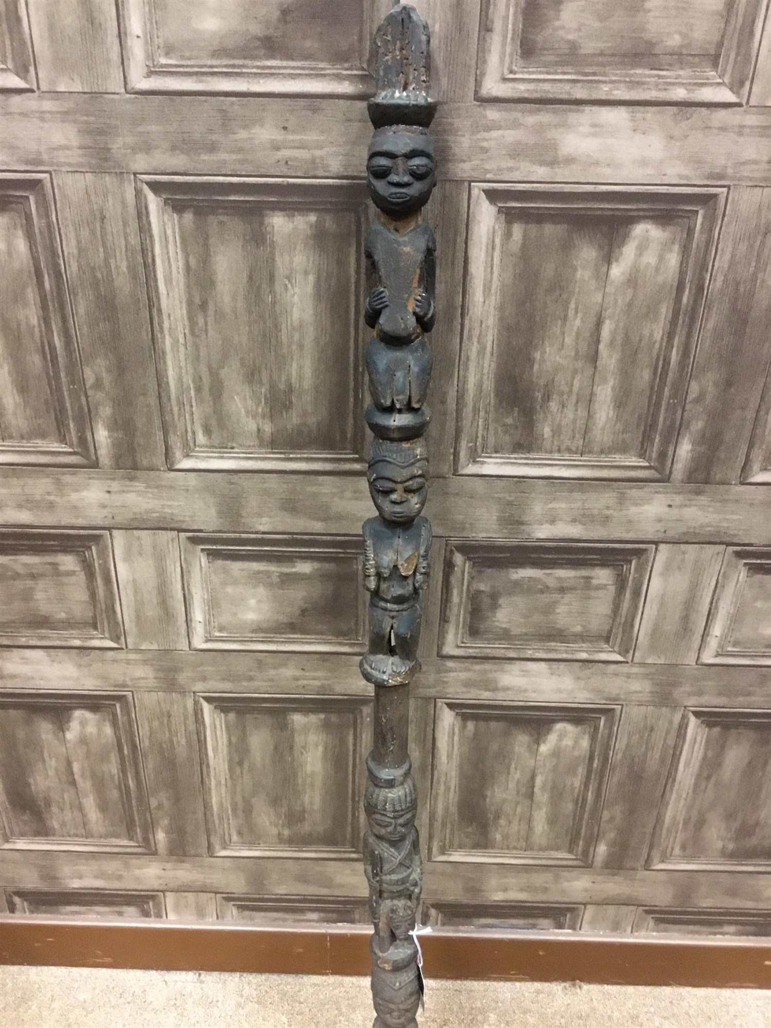 AN AFRICAN CARVED WOOD STAFF