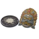 A TIBETAN JEWELLED WALL MASK AND A PLAQUE