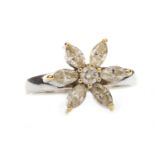 A DIAMOND FLORAL MOTIF RING