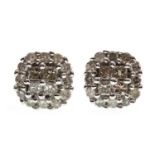 A PAIR OF DIAMOND CLUSTER EARRINGS