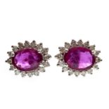 A PAIR OF RUBY AND DIAMOND STUD EARRINGS