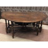 A LARGE OAK GATE-LEG DINING TABLE