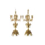 A PAIR OF VICTORIAN BRASS CANDELABRA