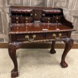 A MINIATURE MAHOGANY WRITING TABLE