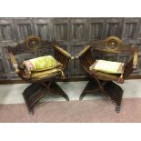 A PAIR OF SAVONAROLA TYPE CHAIRS