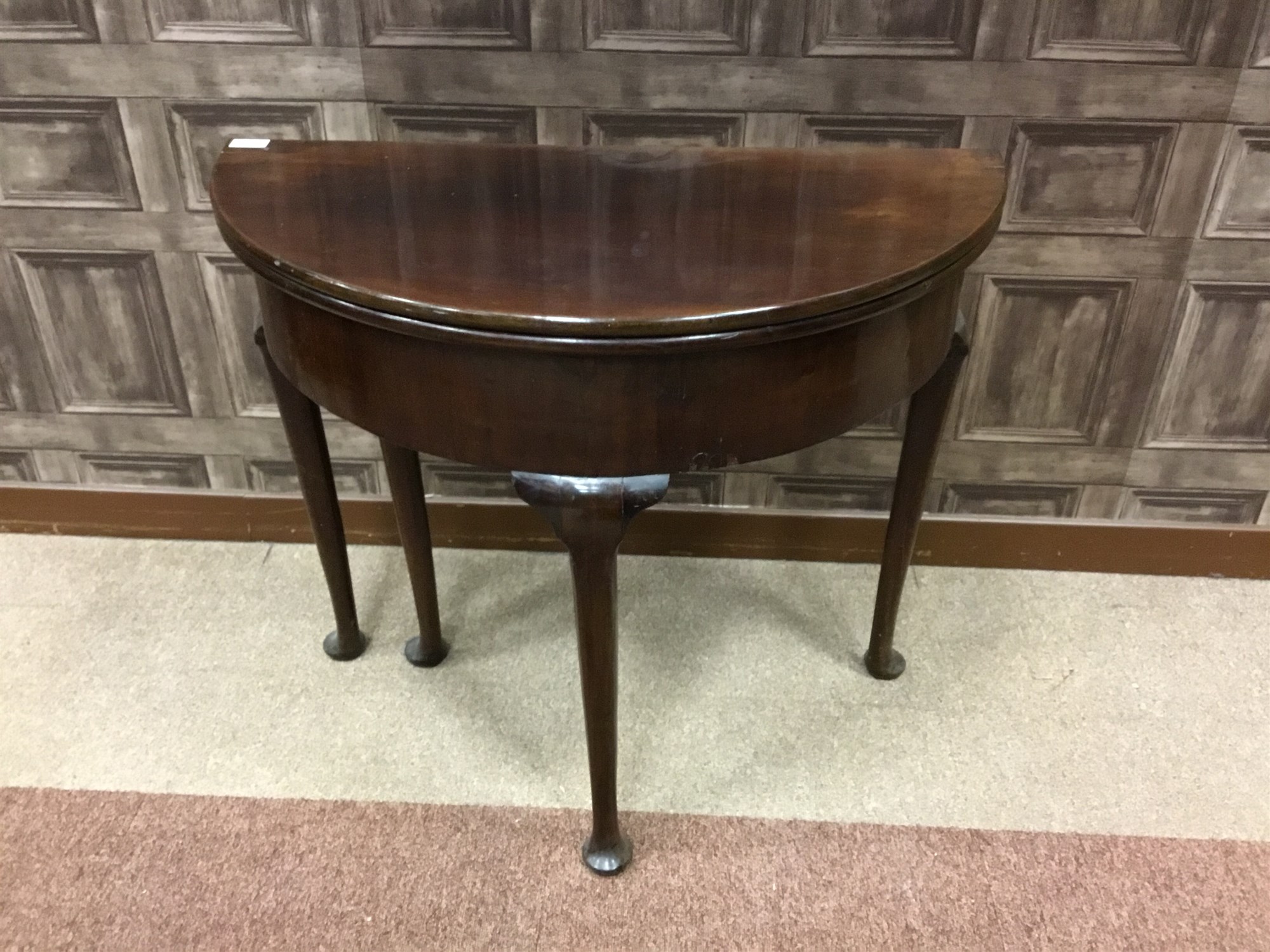 A VICTORIAN MAHOGANY FOLD OVER TEA TABLE