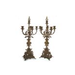 A PAIR OF LATE 19TH CENTURY GILDED CAST METAL CANDELABRA