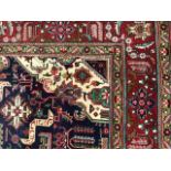 A 20TH CENTURY SHIRAZ PERSIAN RUG