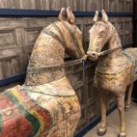 TWO WOODEN HORSES