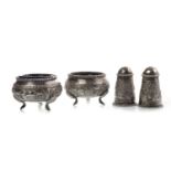 A PAIR OF INDIAN SILVER SALT DISHES AND MATCHING PEPPER POTS