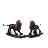 A PAIR OF JAPANESE BRONZE FIGURES OF LIONS