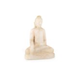 A 20TH CENTURY CARVING OF A SEATED BUDDHA