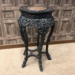 A LATE 19TH/EARLY 20TH CENTURY CHINESE CARVED IRONWOOD PEDESTAL TABLE
