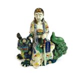 A CHINESE GROUP OF GUANYIN AND A LION