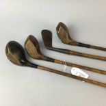 A COLLECTION OF HICKORY SHAFTED GOLF CLUBS AND ANOTHER