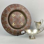 AN INDIAN BRASS CHARGER, SILVER PLATED BOWL AND TWIN HANDLED BOWL