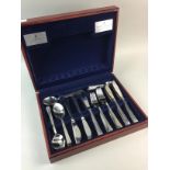 A CANTEEN OF VINERS CUTLERY, SIX CRYSTAL GLASSES AND AN ALARM CLOCK