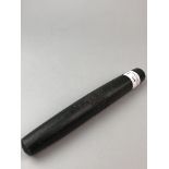 AN UNUSUAL CARVED STONE BATON