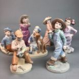 A COLLECTION OF COALPORT CHILDREN OF THE WEEK FIGURES