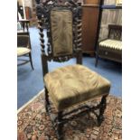 A 20TH CENTURY CARVED OAK CHAIR