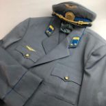 A RUSSIAN GREY SERGE UNIFORM AND CAP