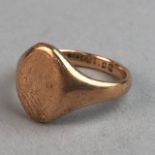 A NINE CARAT GOLD SIGNET RING