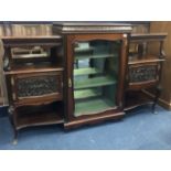 A STAINED WOOD DISPLAY CABINET