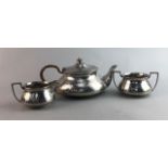 A BEATEN PEWTER THREE PIECE TEA SERVICE