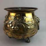 A BRASS TWO HANDLED POT AND A WOODEN JEWELLERY BOX