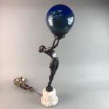 AN ART DECO STYLE FIGURAL LAMP WITH BLUE SHADE