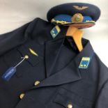 A RUSSIAN NAVY SERGE UNIFORM AND CAP