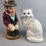A STAFFORDSHIRE FIGURE OF A CAT AND OTHER ITEMS