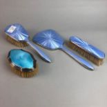 A SILVER AND ENAMEL DRESSING TABLE SET